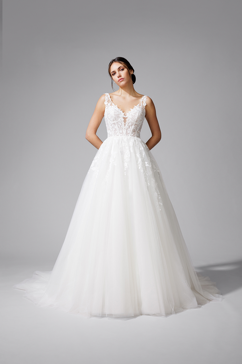 A Linien Brautkleid mit Illusionsausschnitt und Spitze A Linien Brautkleid mit tiefem Illusionsausschnitt, transparenter Corsage, floraler Spitze und voluminösem Tüllrock